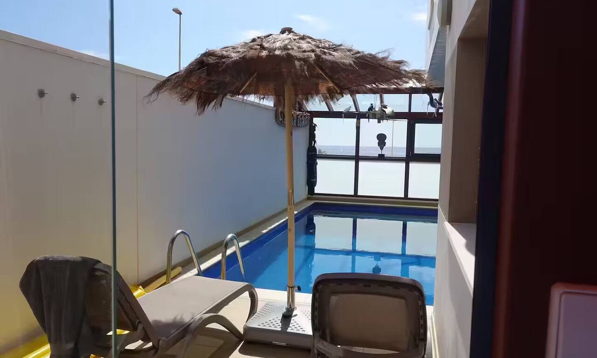 Los Gavilanes House | Designer home with a heated (covered) pool