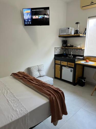 Jardim Ipe Apartment | Flat com ar e varanda com linda vista para o Ibituruna, Wi-Fi - Véu de Noiva 204