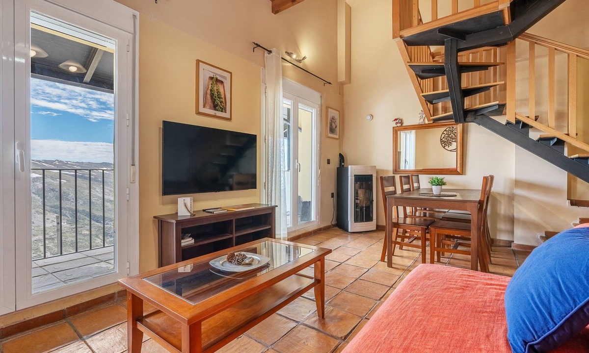 Pradollano Apartment | Holiday Apartment "Duplex 23 E" with Mountain Views, Private Terrace and Wi-Fi