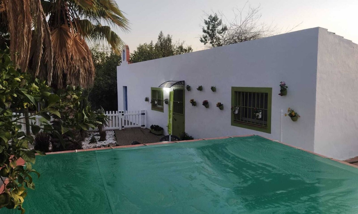 Aznalcazar Apartment | Rural apartment with garden, barbecue and private swimming pool.