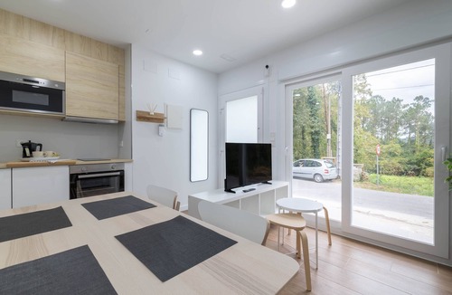 Rates Apartment | Apartamento Aurora con vistas a la montaña, jardín compartido y aire acondicionado