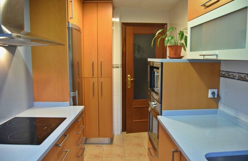Castro Urdiales Apartment | Apartment with 2 Terraces, Sea Views, Pool, and Garden