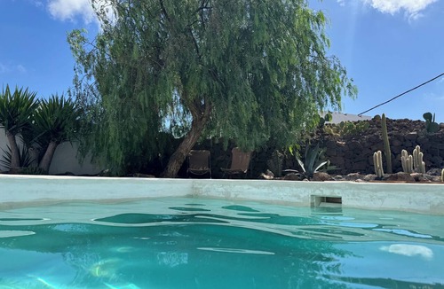Guatiza House | Casita Coco: Peaceful Boutique Retreat with Heated Pool & Private Terrace