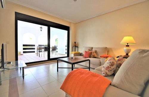 Nueva Andalucia Apartment | Central apartment with pool, air-con and Wifi, Short walk to Puerto Banus shops, bars & cafes