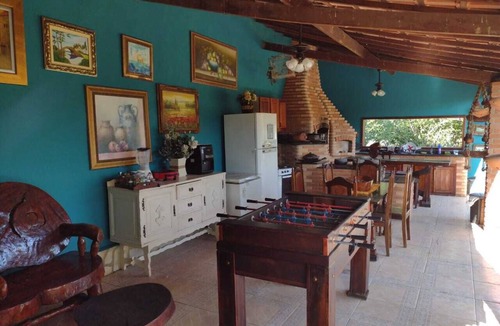Quatis House | Charming place, suite with fireplace.