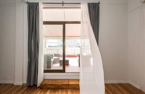 Centro Apartment | Enjoy the private terrace with your group at Madrid's most Iconic address