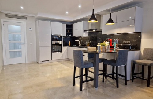 New Golden Mile Apartment | First Line ground floor App. with garden, 6 people, directly at sea and pool.