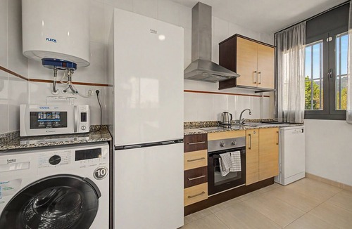 Sant Carles de la Rapita House | Holiday Apartment 'Pedragosa' close to the Beach with Mountain View, Shared Pool & Wi-Fi