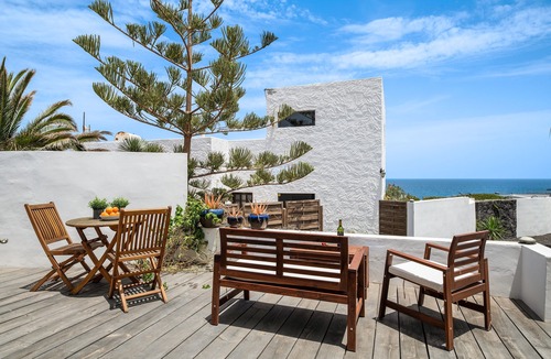 Haria Apartment | Vacation Apartment 'Playa Marina Eco Bungalow Arrieta' with Sea View, Private Terrace and Wi-Fi