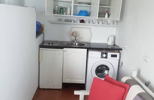 Punta Mujeres Apartment | Waterfront Apartment with roof Terrace. Children free in summer.