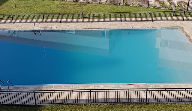 3-bedroom apartment with a 100-meter patio featuring a barbecue and an outdoor pool