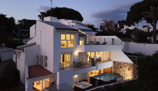 Beach villa with private pool, jacuzzi, sea views, walk to beach, extra pool