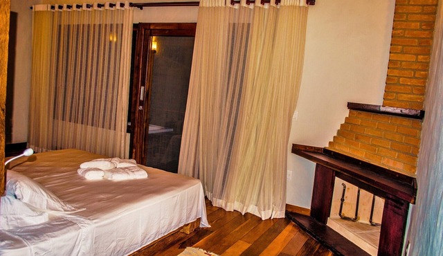 Couples cottage with whirlpool and fireplace in Passa Vinte