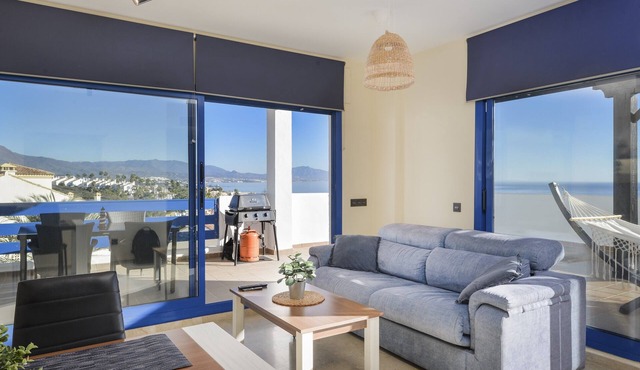 Holiday Apartment "El Hacho" with Sea View, Shared Pool & Wi-Fi
