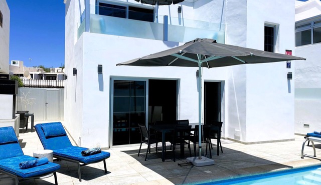 Modern detached villa with private heated pool in the heart of Puerto Del Carmen