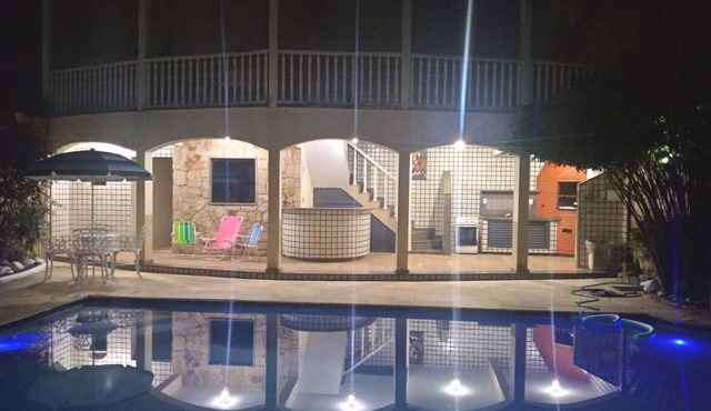Soap opera house, sun and pool.