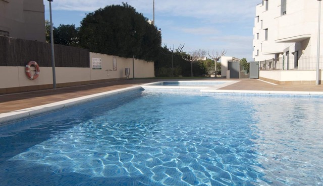 Spectacular apartment with communal pool and views of the port