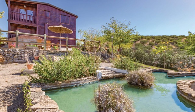 This completely wooden constructed vacation home in Priego de Córdoba offers space for 6 vacation gu in Priego de Córdoba