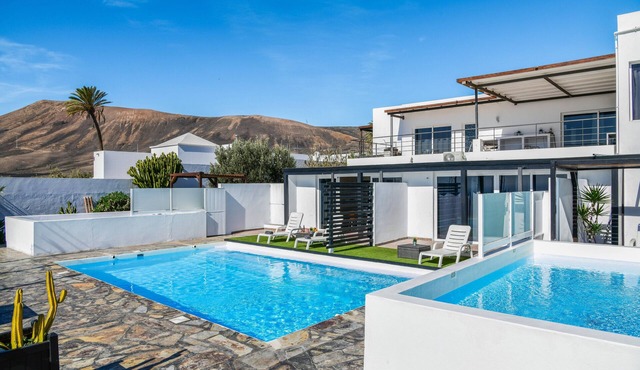 Vacation Apartment "Casa Amanecer 3" with Sea & Mountain Views, Pool, and Terrace