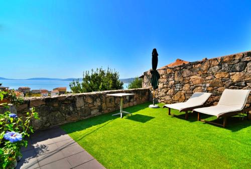 Casa con impresionantes vistas al mar en O Pindo
